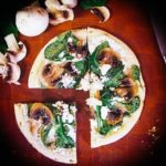 Spinach, mushroom and goat cheese pizza