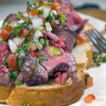 Pico de gallo over seared beef and toasted bread. Heavenly.