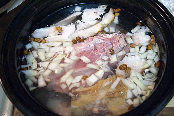 Don't waste that leftover ham bone! Use it to make a comforting batch of crock-pot ham and beans, a Southern comfort food staple.