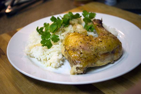 Baked Chicken Leg Quarters with Caramelized Onions.