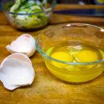 Crack three eggs Crack three eggs