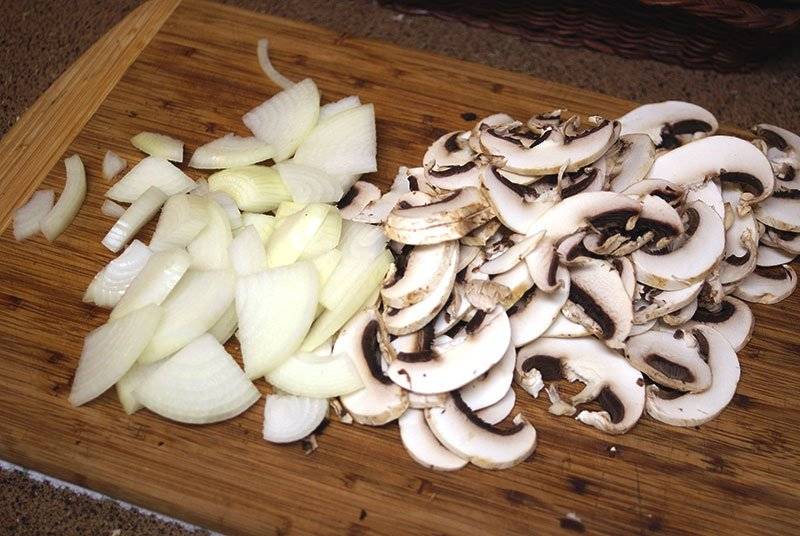 Onions and mushrooms for Every Day Smothered Turkey Burgers