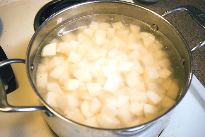 boiling potatoes for cheesy potato soup with ham and broccoli