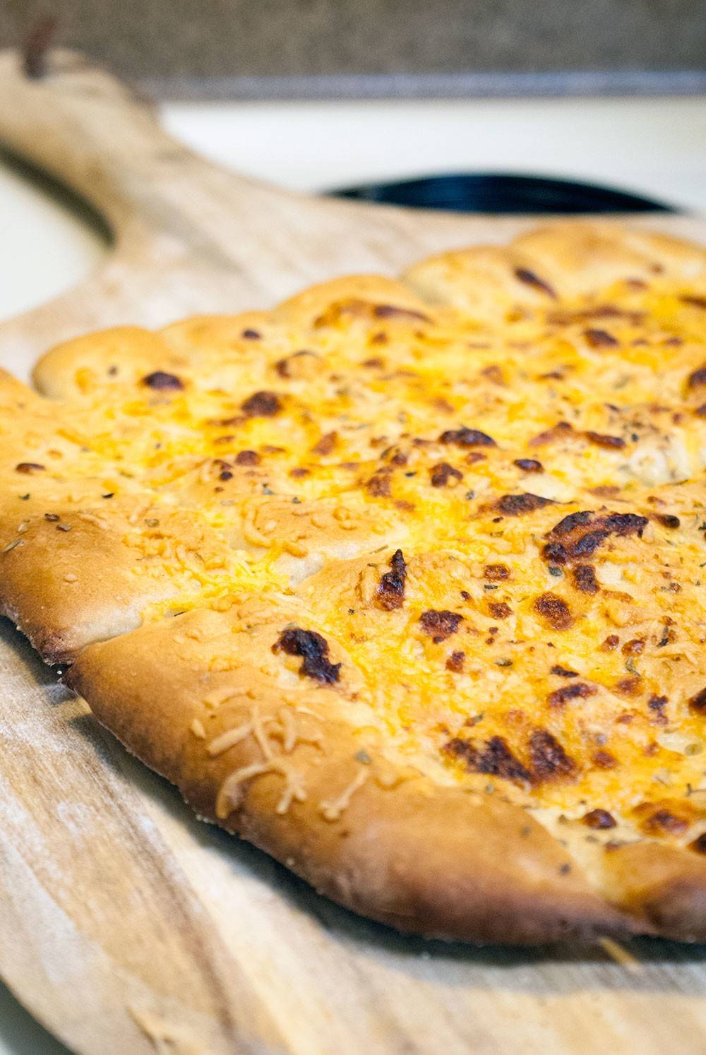 Cheesy Breadsticks with herbs & olive oil. Ready in 15 minutes from start to finish.