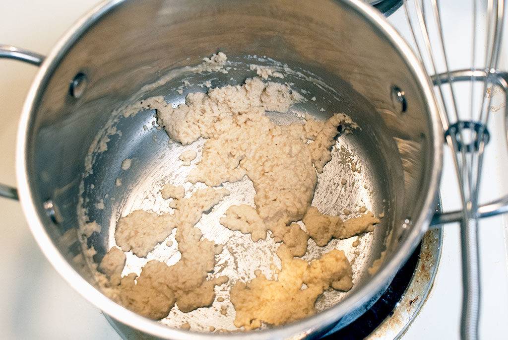 Add flour to the leftover fat plus oil if needed