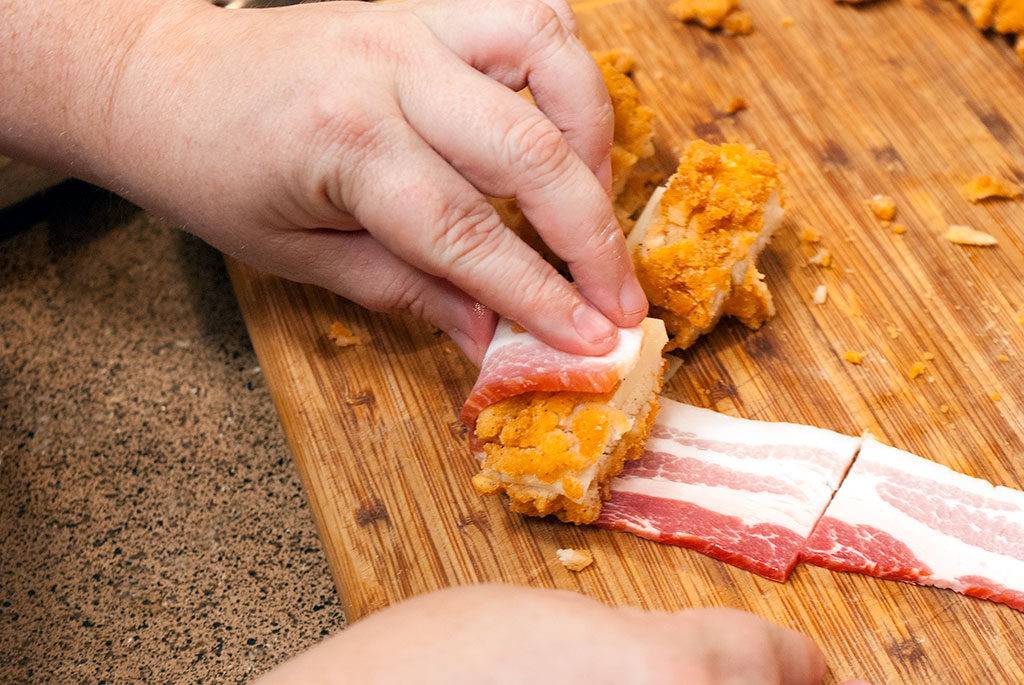 NOw the fun part - Wrap those chicken and cheese bits in bacon!