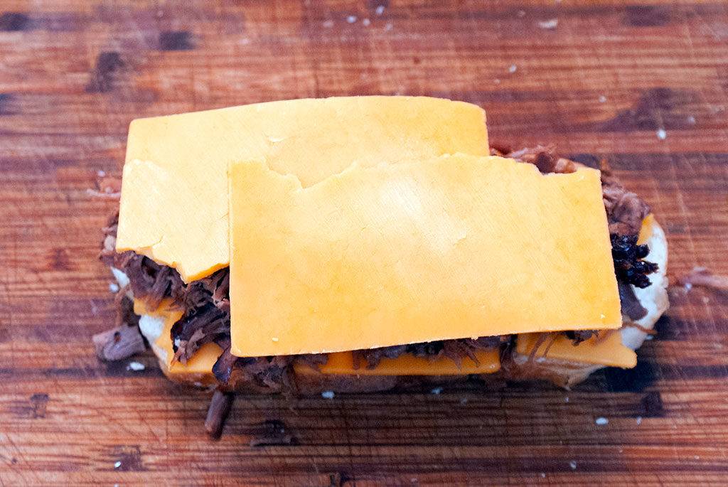 Assembling the Roast Beef Melt Sandwich. Lay on more 100% real, natural cheese.