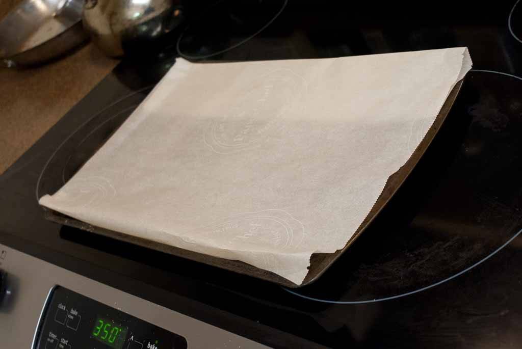Sheet pan lined with parchment paper.