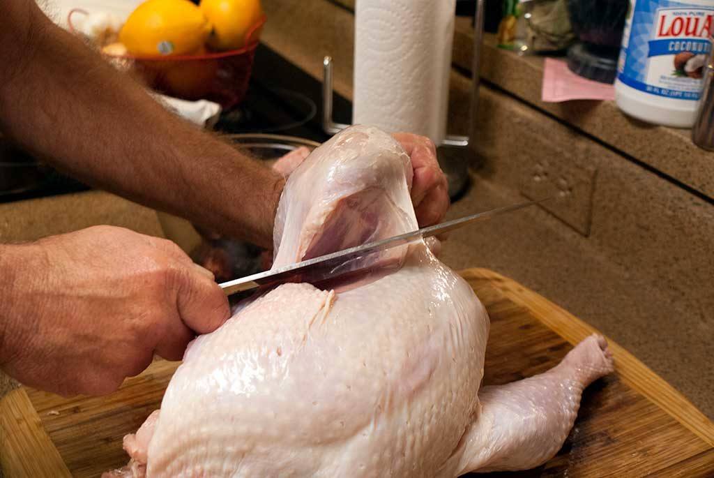 cutting the leg and thigh off a turkey - How to butcher a turkey series