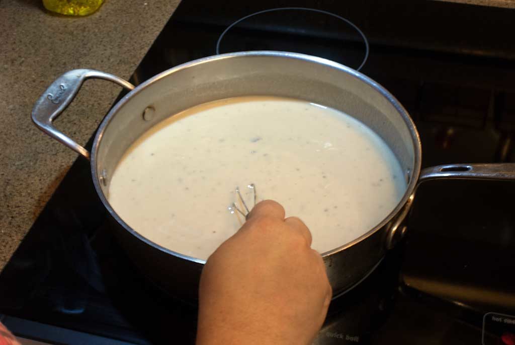 Mix condensed soup and milk until smooth