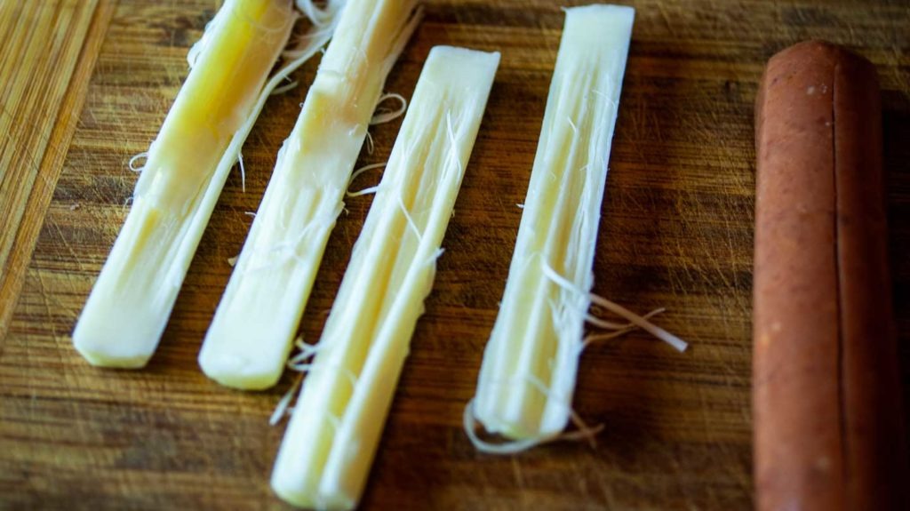 String cheese sticks split in half