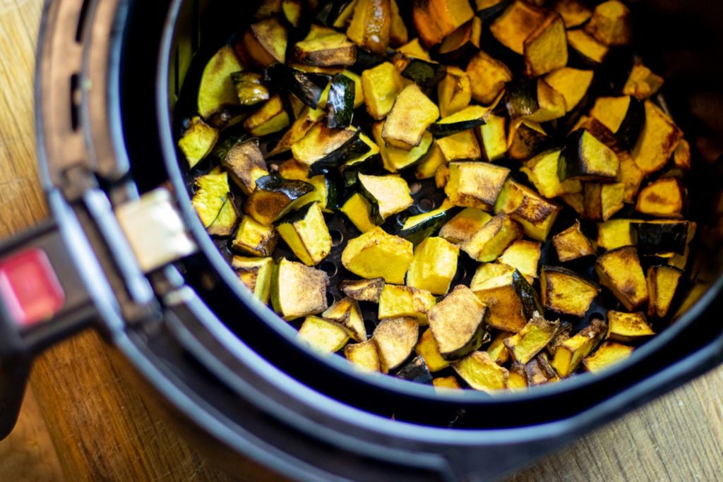 Roasted acorn squash in air fryer basket