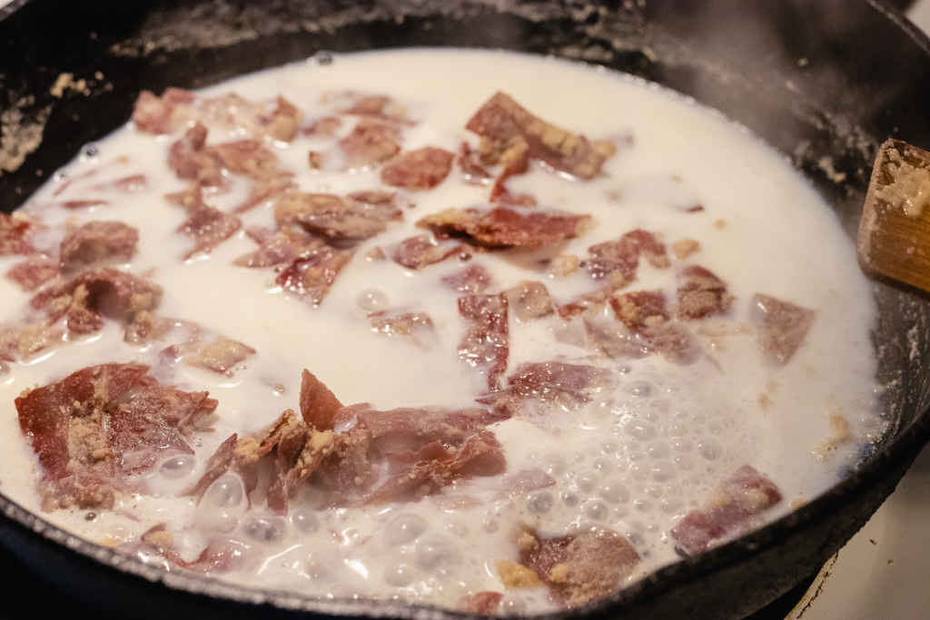 Creamed chipped beef (S.O.S.) Sauce in a skillet.